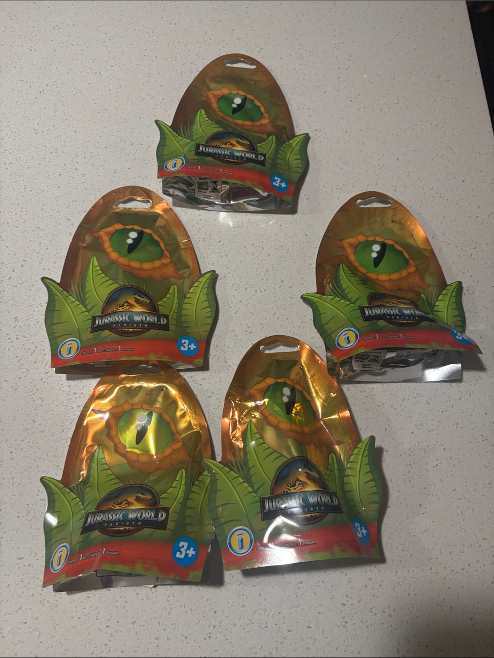 Jurassic World Surprise Toy Pack - Gold/Green Set of 5